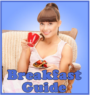 a woman eats waffles strawberries and coffee for breakfast